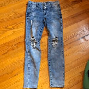 High waisted distressed jeans